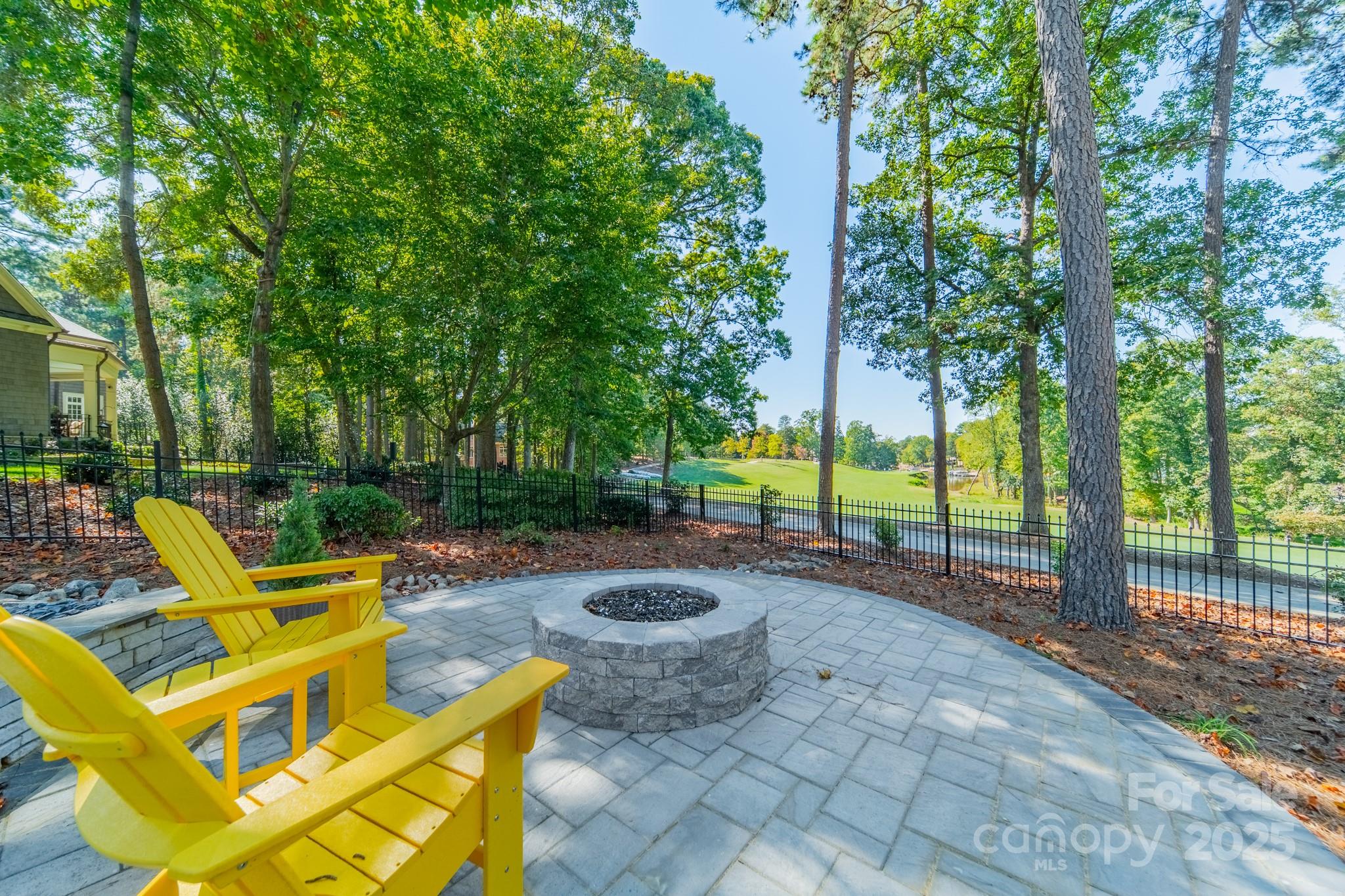 1946 Brawley School Road Mooresville, NC 28117 - Photo 8 of 48 a view of a backyard with swimming pool