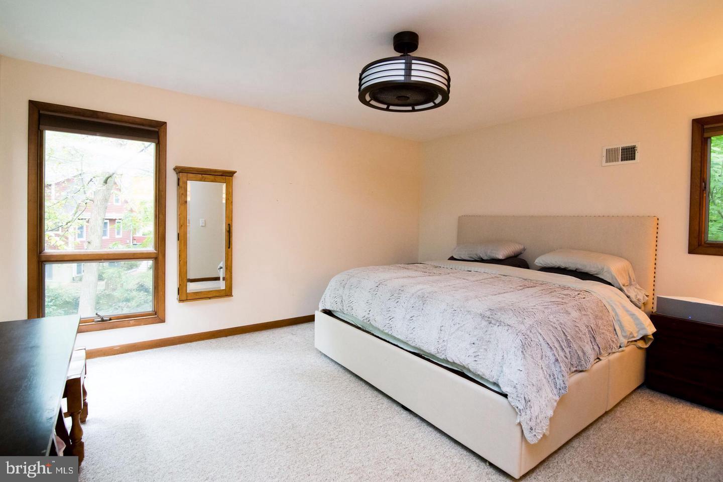 349 Epping Way Annapolis, MD 21401 - Photo 18 of 24 a bedroom with a bed and a large window