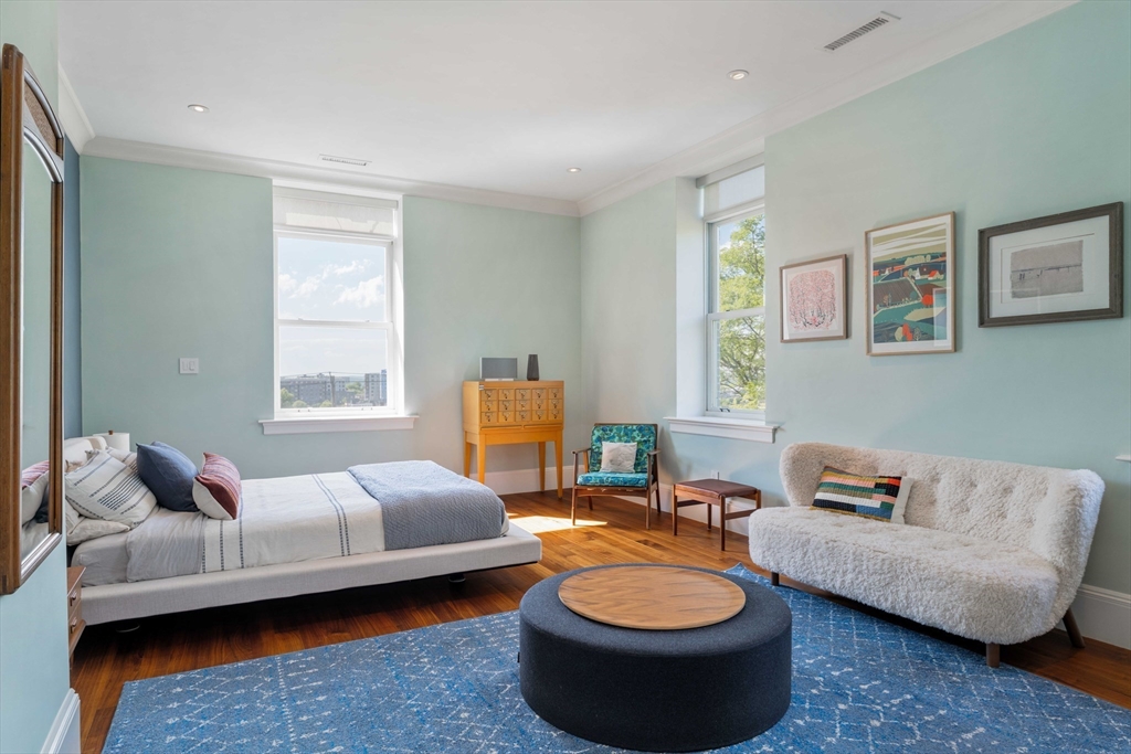 232 Summit Avenue, Unit A5 Brookline, MA 02446 - Photo 12 of 21 a living room with furniture and a window