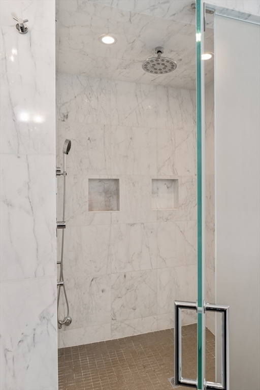 232 Summit Avenue, Unit A5 Brookline, MA 02446 - Photo 16 of 21 a bathroom with a shower