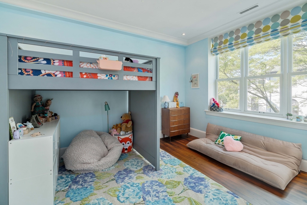 232 Summit Avenue, Unit A5 Brookline, MA 02446 - Photo 17 of 21 a living room with furniture and a window
