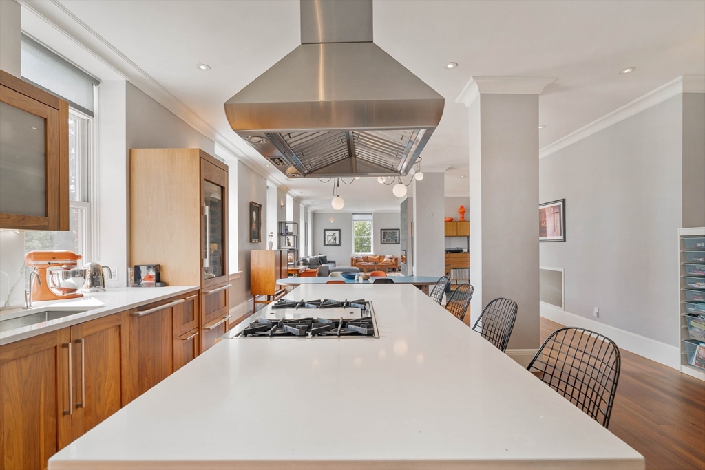 232 Summit Avenue, Unit A5 Brookline, MA 02446 - Photo 3 of 21 a large white room with a large window