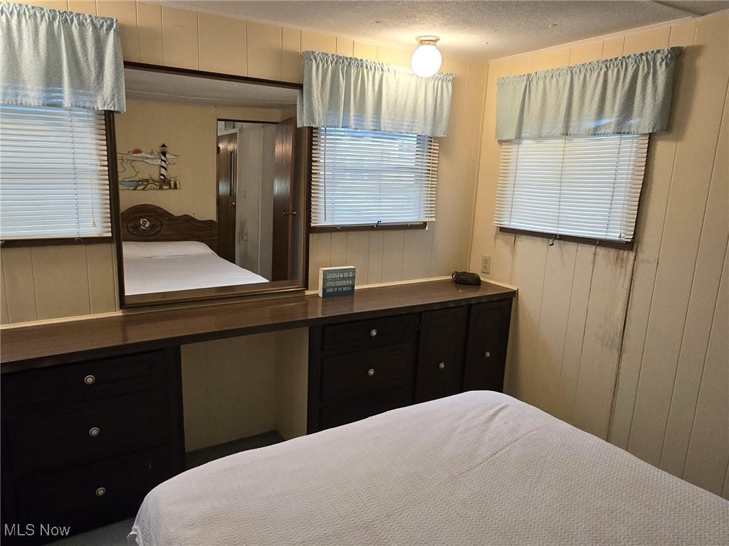 3575 Northeast Catawba Road, Unit 11 Port Clinton, OH 43452 - Photo 17 of 23 Bedroom with built in cabinets