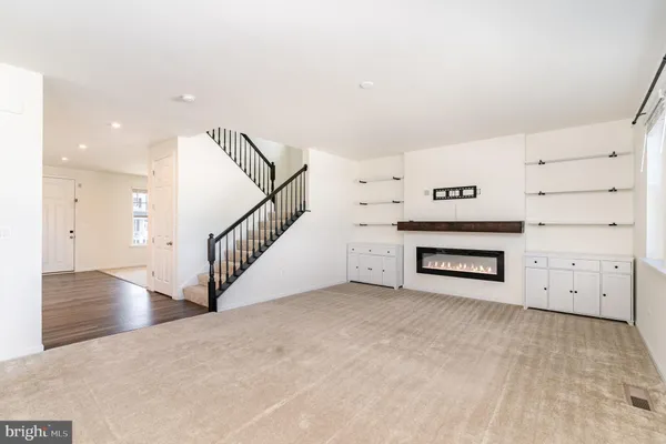 a view of a kitchen with a sink