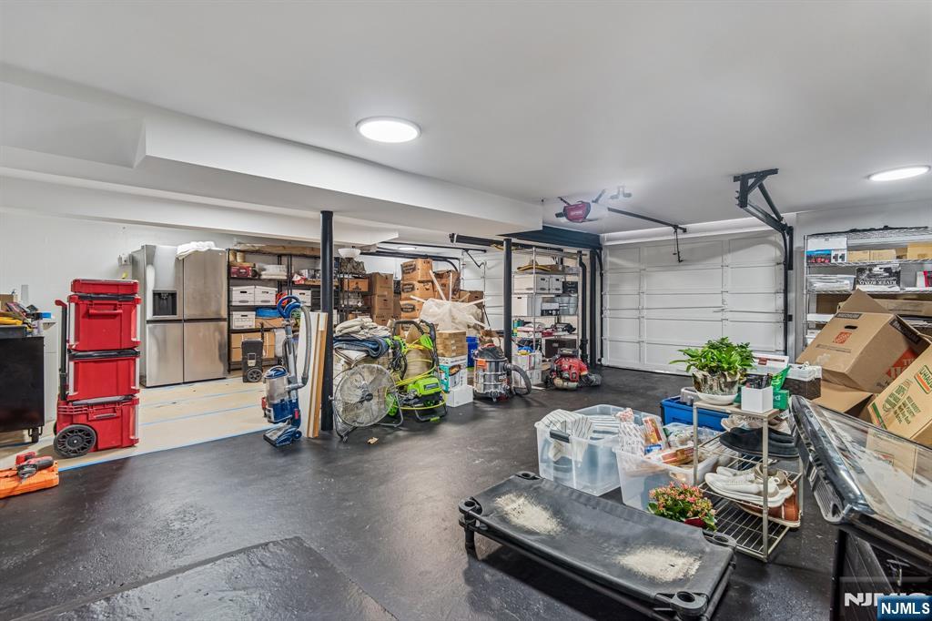 395 Highview Road Englewood, NJ 07631 - Photo 11 of 13 a room with gym equipment and a table