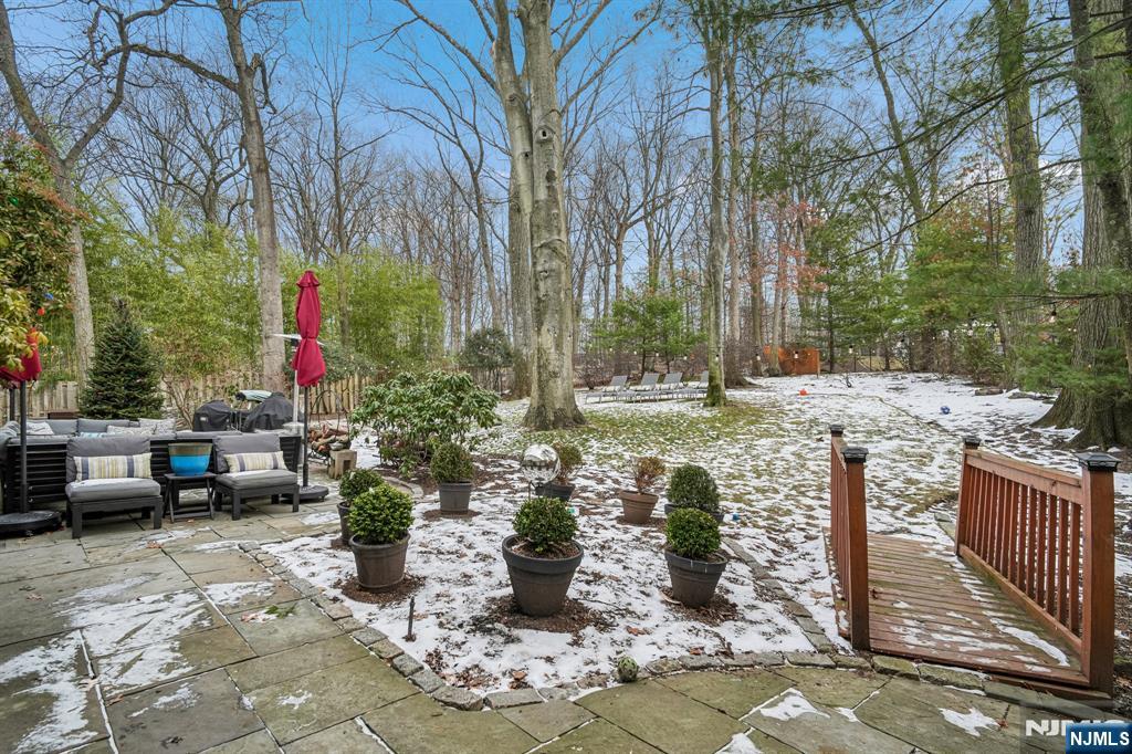 395 Highview Road Englewood, NJ 07631 - Photo 13 of 13 a view of a backyard with sitting area