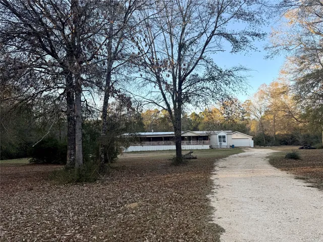 a view of backyard with green space