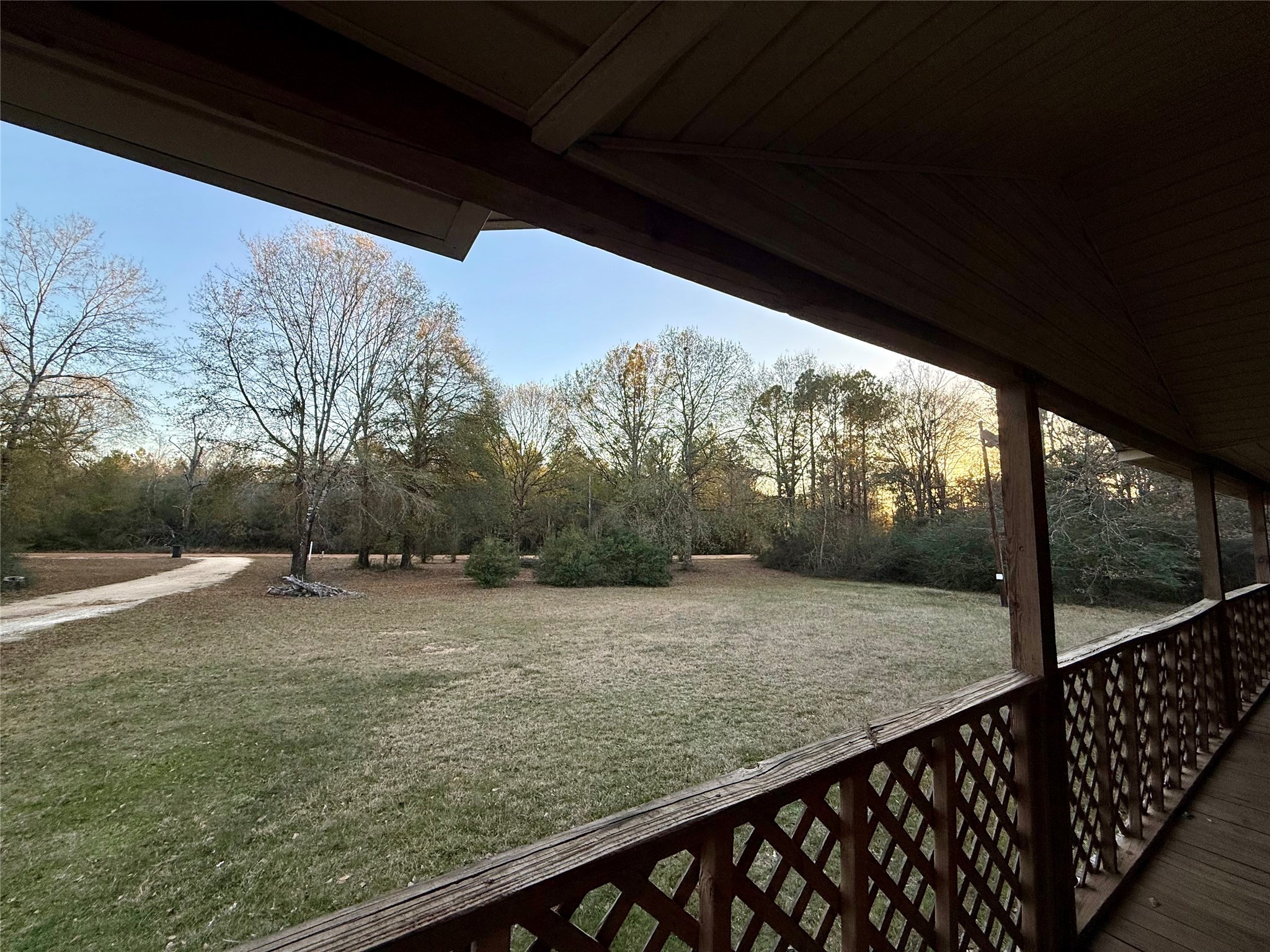 669 County Road 1245 Warren, TX 77664 - Photo 6 of 28 a view of a road from a balcony