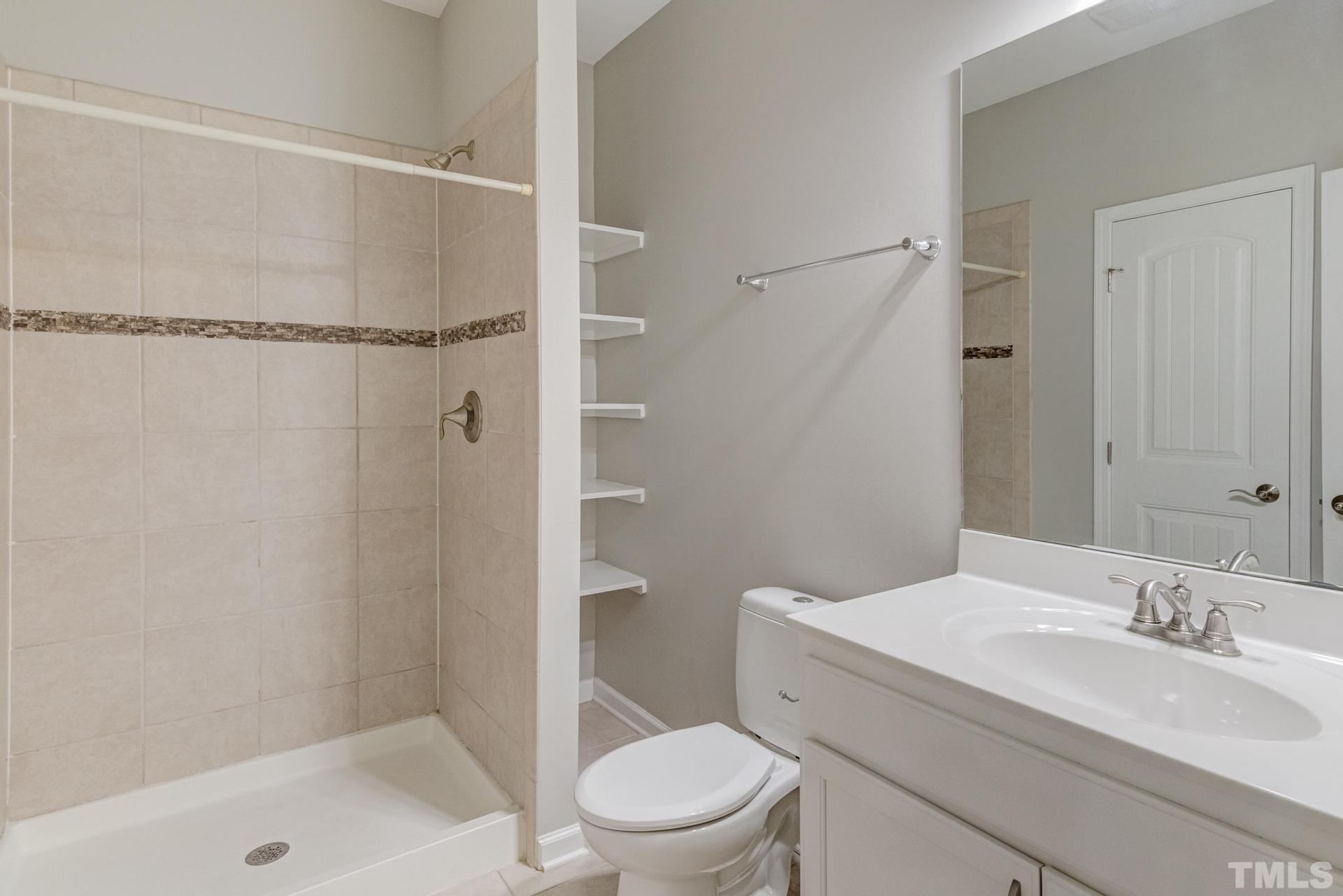 6307 Yates Mill Pond Road Raleigh, NC 27606 - Photo 18 of 41 Main floor owner's bath!