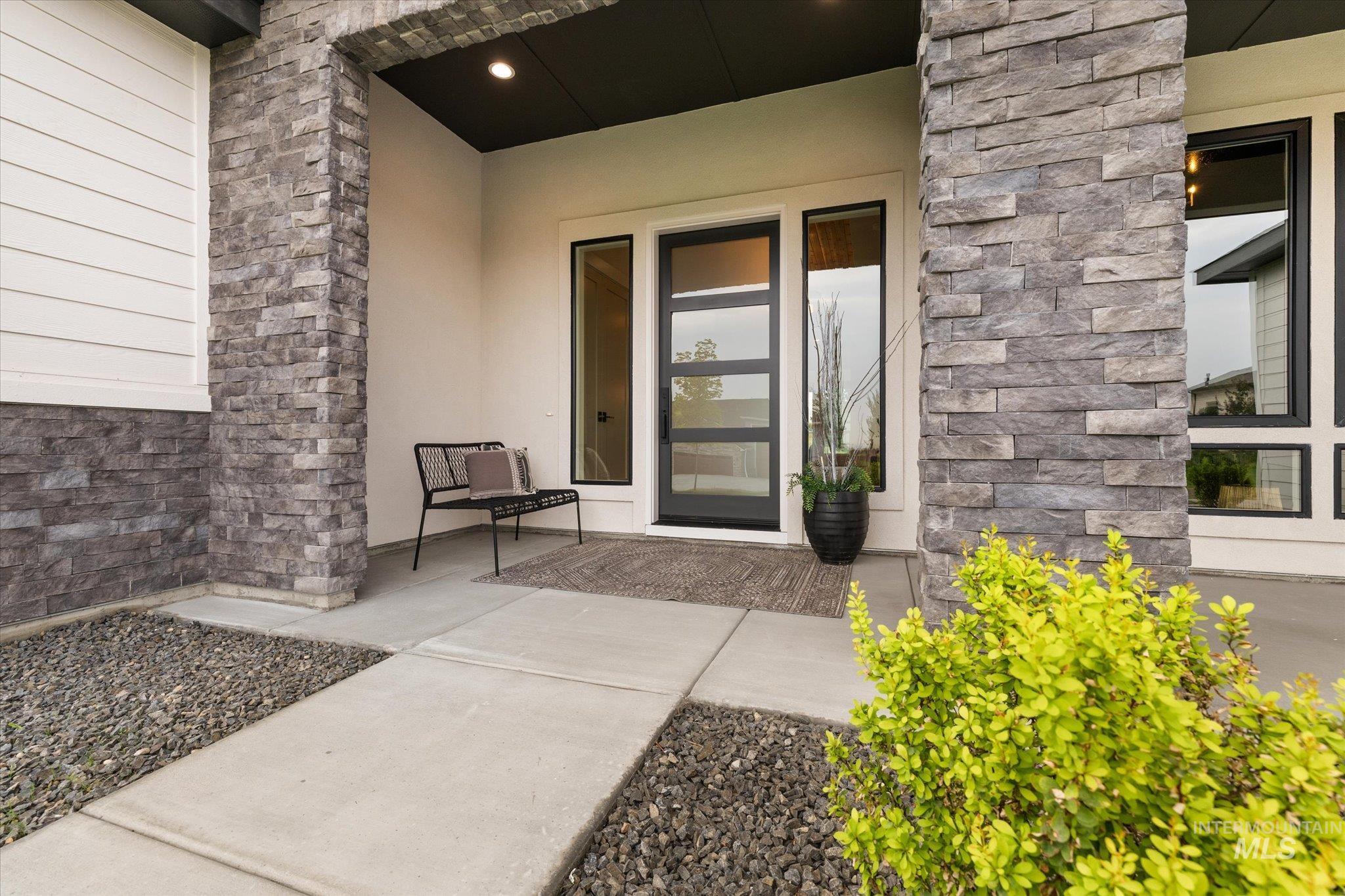22909 Cirrus Vw Court Caldwell, ID 83607 - Photo 3 of 50 Entrance to property featuring stone siding and stucco siding