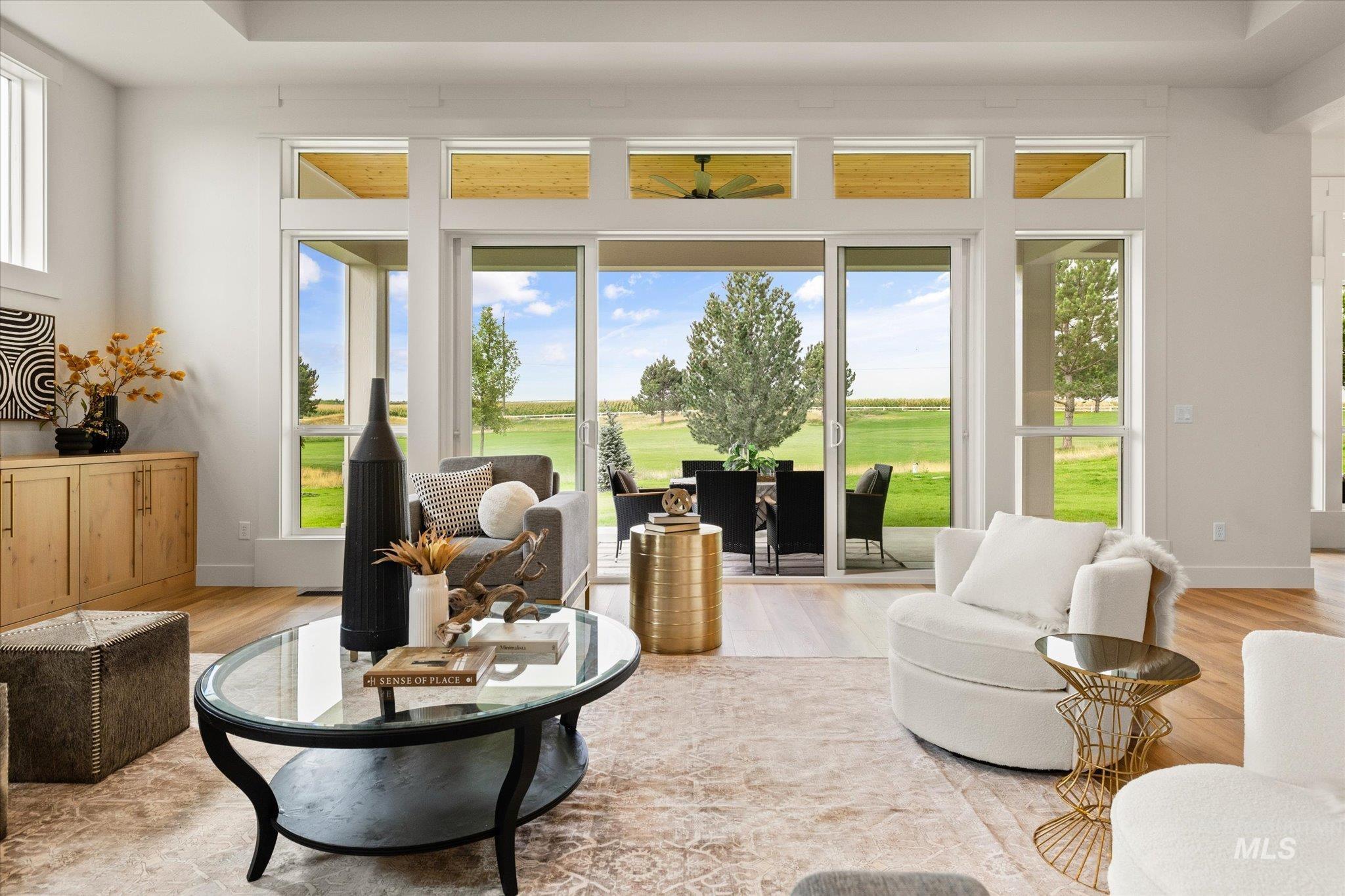 22909 Cirrus Vw Court Caldwell, ID 83607 - Photo 8 of 50 Doorway featuring wood finished floors and golf course view