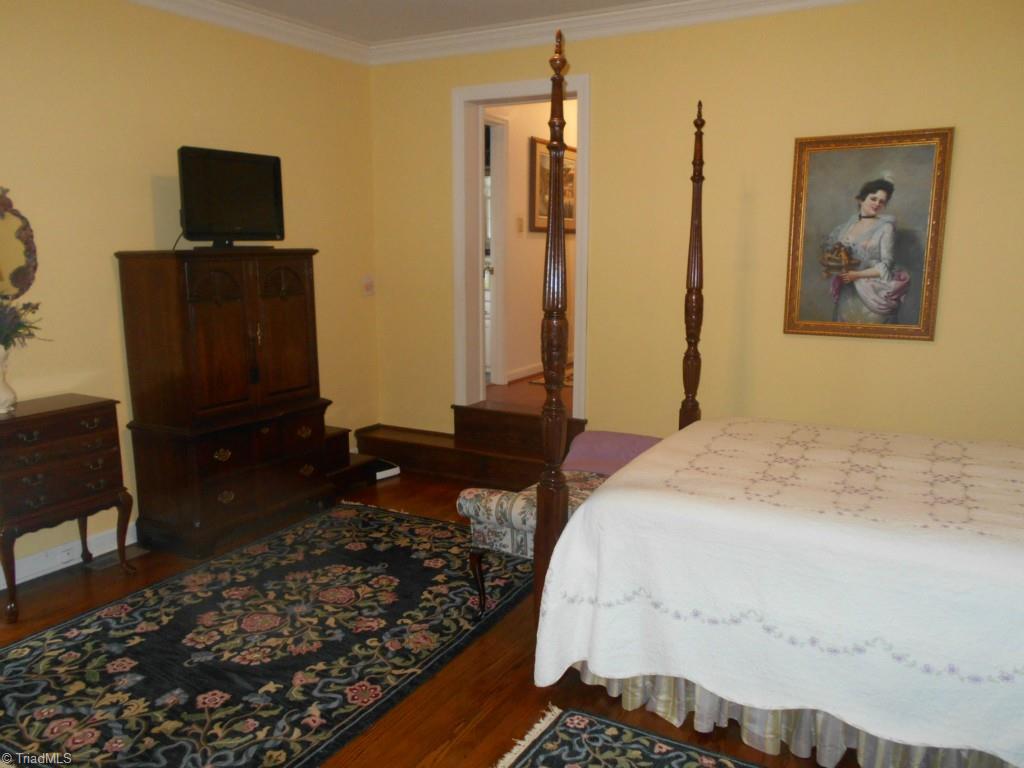 408 Traceway Road High Point, NC 27265 - Photo 11 of 22 Master bedroom with hard wood floors and a private porch.