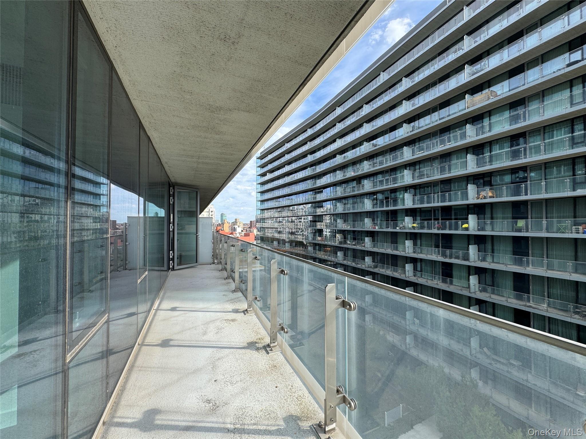 131-03 40 Road, Unit 16P Queens, NY 11354 - Photo 8 of 13 a view of a balcony