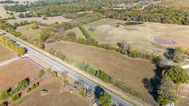 a view of swimming pool with a balcony