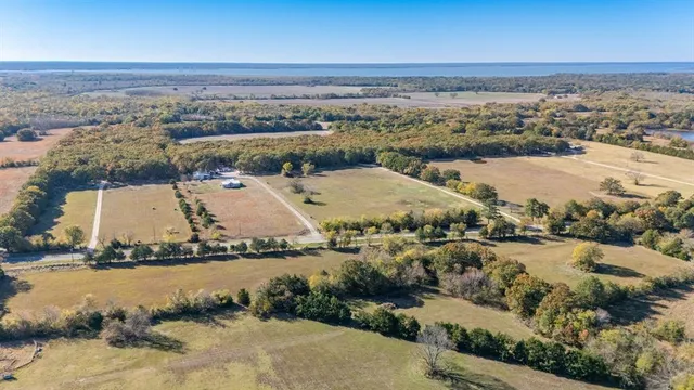 an aerial view of residential building and ocean