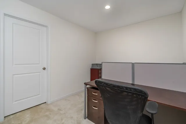 a view of a air conditioner and an empty room
