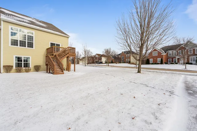 a view of a yard with a snow