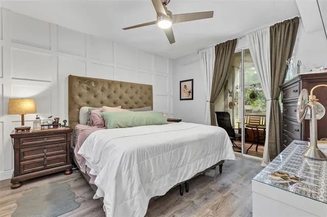 a bedroom with a bed and dresser