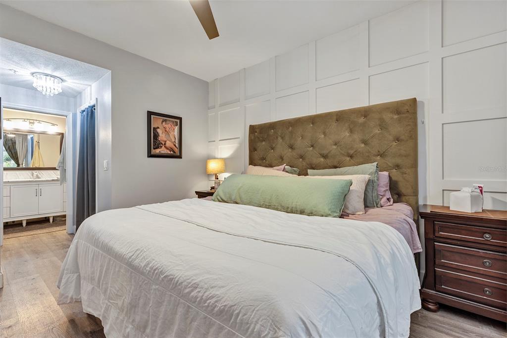 550 Cranes Way, Unit 120 Altamonte Springs, FL 32701 - Photo 13 of 32 a bedroom with a bed and dresser