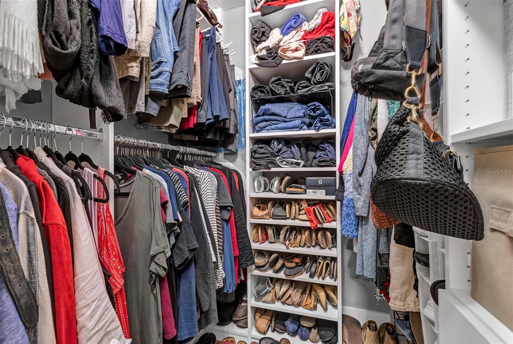 550 Cranes Way, Unit 120 Altamonte Springs, FL 32701 - Photo 15 of 32 a view of walk in closet with clothes and shoes