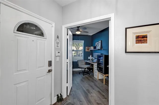 a workspace with furniture and a window