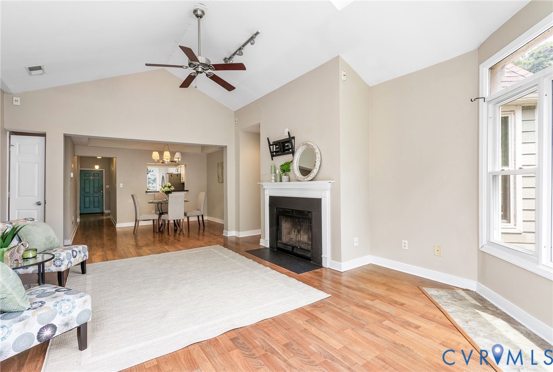 318 Water Pointe Lane Midlothian, VA 23112 - Photo 11 of 50 a living room with furniture and a fireplace