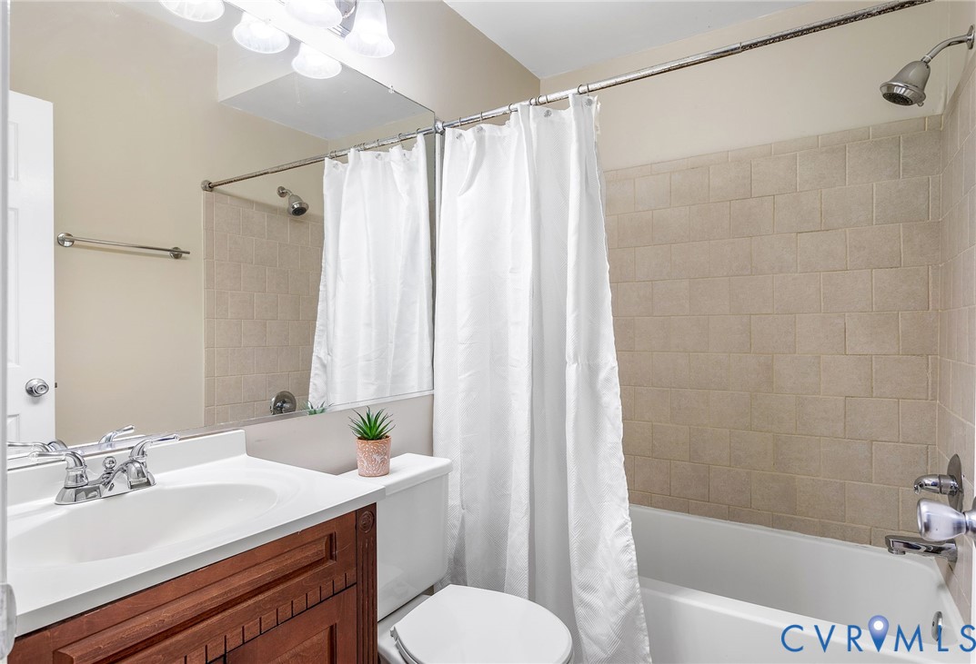 318 Water Pointe Lane Midlothian, VA 23112 - Photo 16 of 36 a bathroom with a sink a toilet and shower