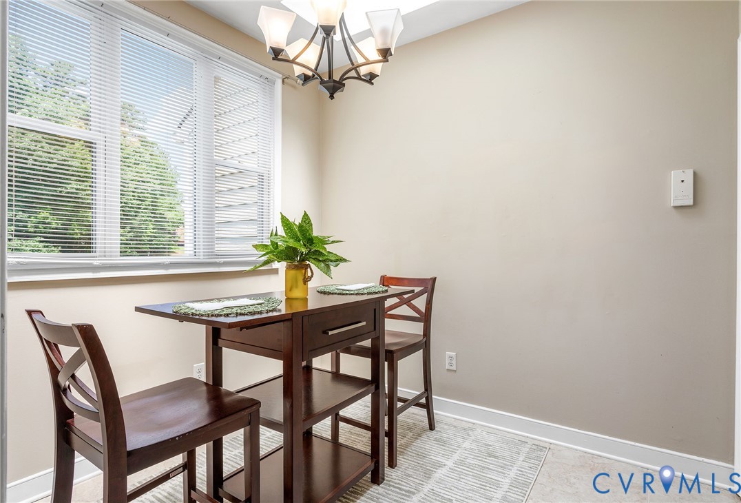 318 Water Pointe Lane Midlothian, VA 23112 - Photo 16 of 50 a view of a dining room with furniture window and outside view