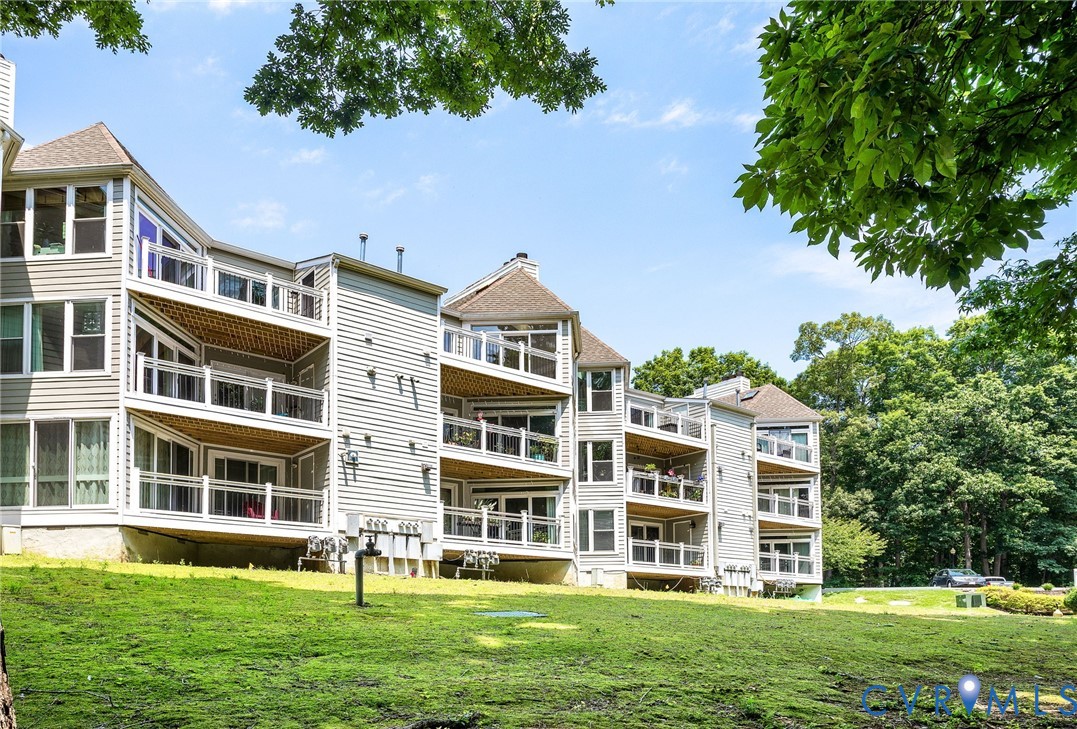 318 Water Pointe Lane Midlothian, VA 23112 - Photo 29 of 50 front view of a building with a yard