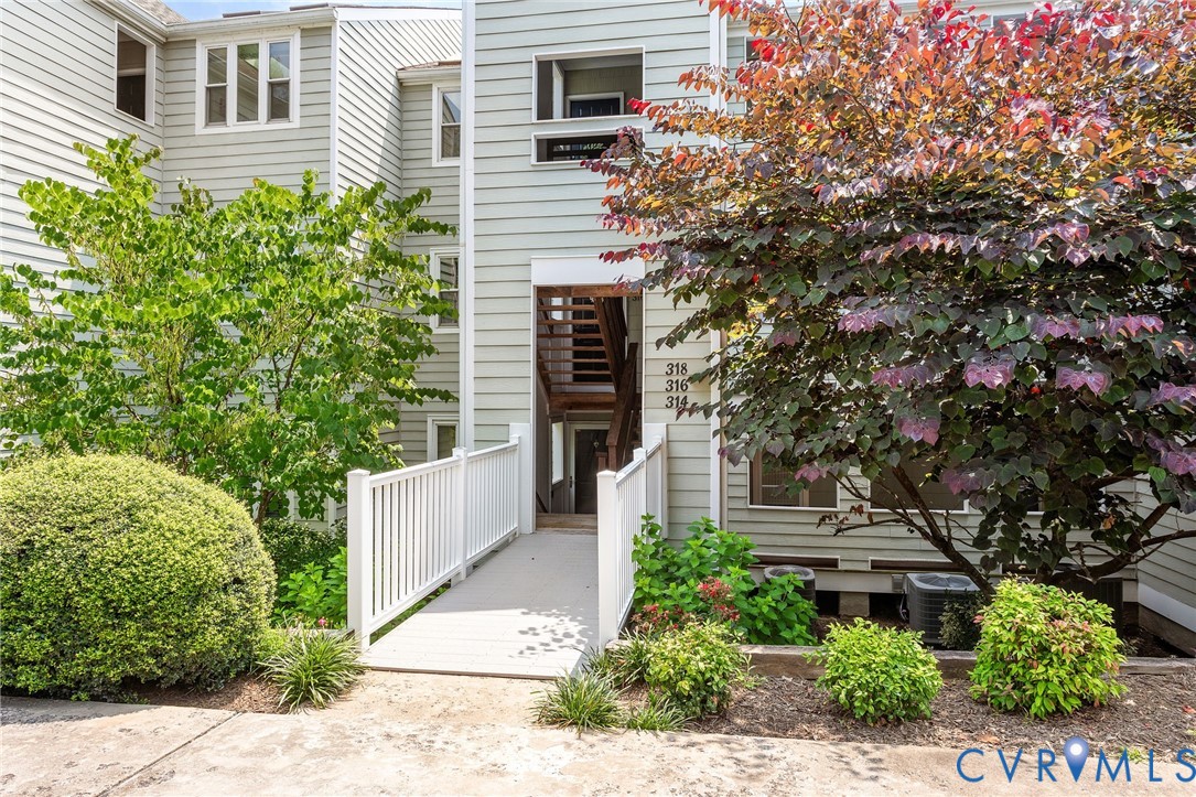 318 Water Pointe Lane Midlothian, VA 23112 - Photo 3 of 50 a front view of a house with a garden