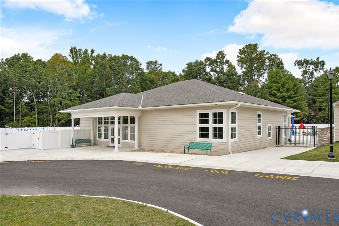 318 Water Pointe Lane Midlothian, VA 23112 - Photo 43 of 50 a front view of a house with a yard and trees