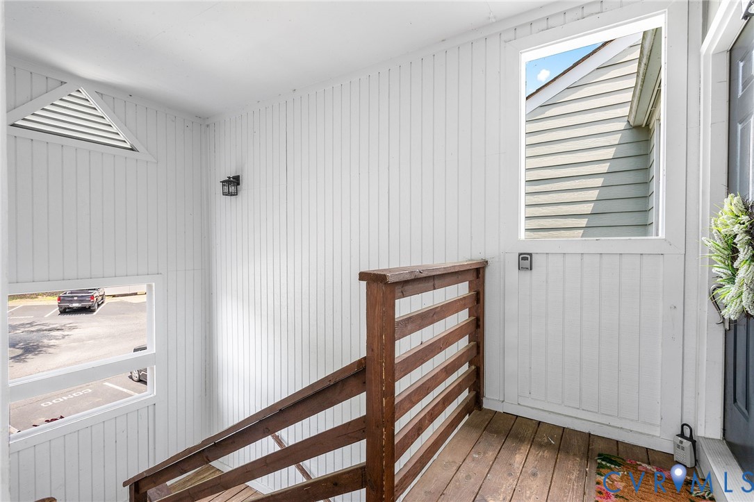 318 Water Pointe Lane Midlothian, VA 23112 - Photo 5 of 50 a view of a hallway with entryway wooden floor and windows