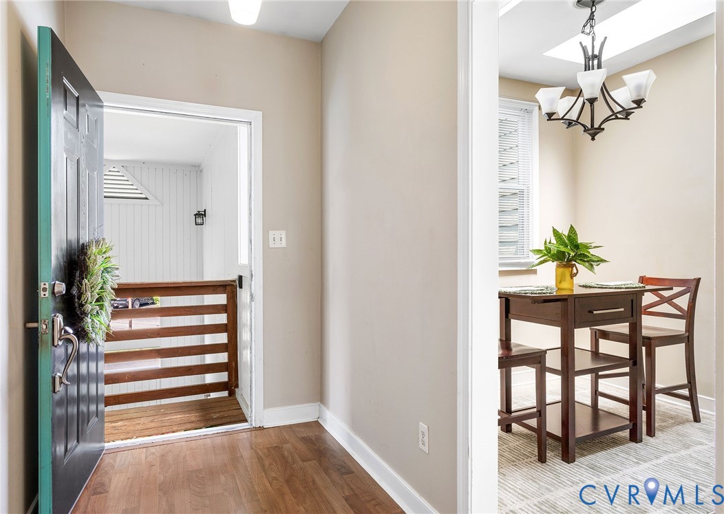 318 Water Pointe Lane Midlothian, VA 23112 - Photo 5 of 36 a view of a dining room with a table and chairs
