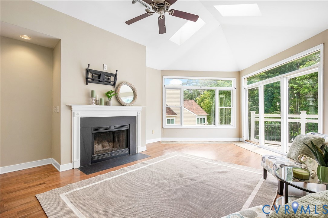 318 Water Pointe Lane Midlothian, VA 23112 - Photo 9 of 50 a living room with furniture and a fireplace