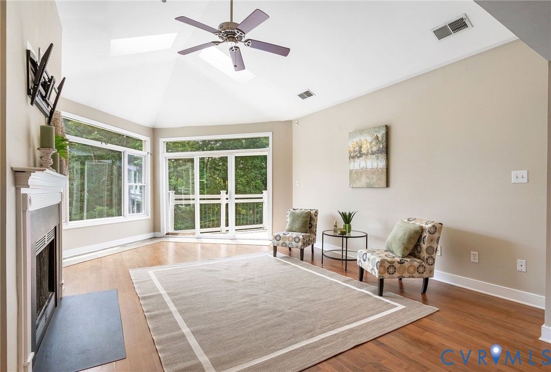 318 Water Pointe Lane Midlothian, VA 23112 - Photo 10 of 50 a living room with furniture and a fireplace