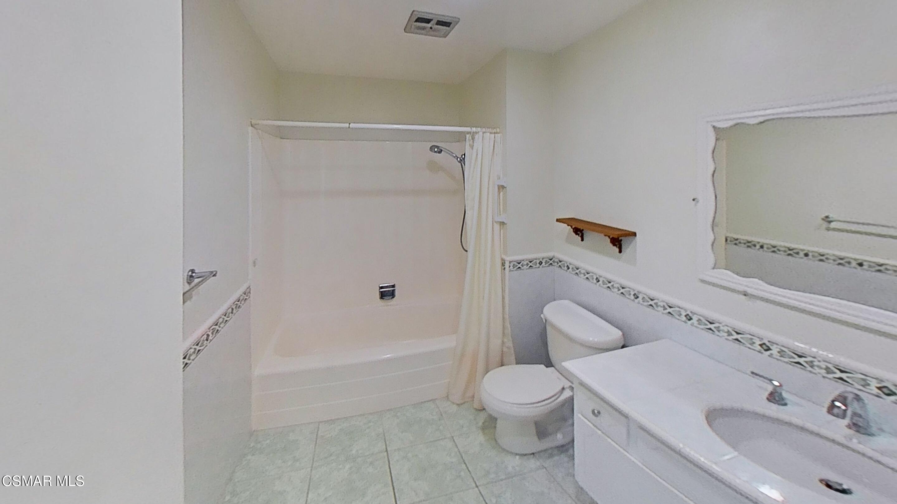 652 Harper Street Simi Valley, CA 93065 - Photo 25 of 30 a white toilet sitting next to a bathroom sink