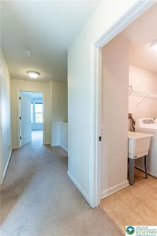 a view of a room that has a bench in it