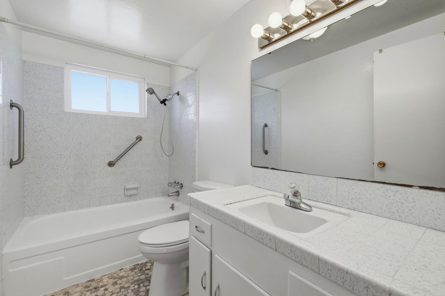 215 Manfre Road Watsonville, CA 95076 - Photo 24 of 36 a bathroom with a sink a toilet and shower