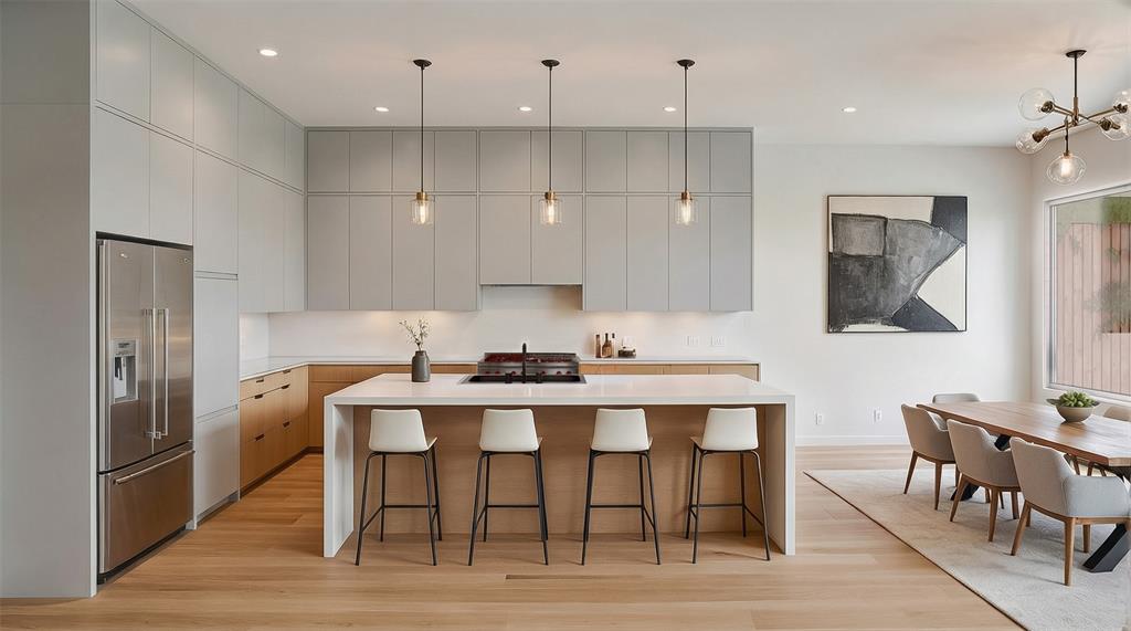 1711 Morris Street Dallas, TX 75212 - Photo 7 of 24 a kitchen that has a table and chairs in it
