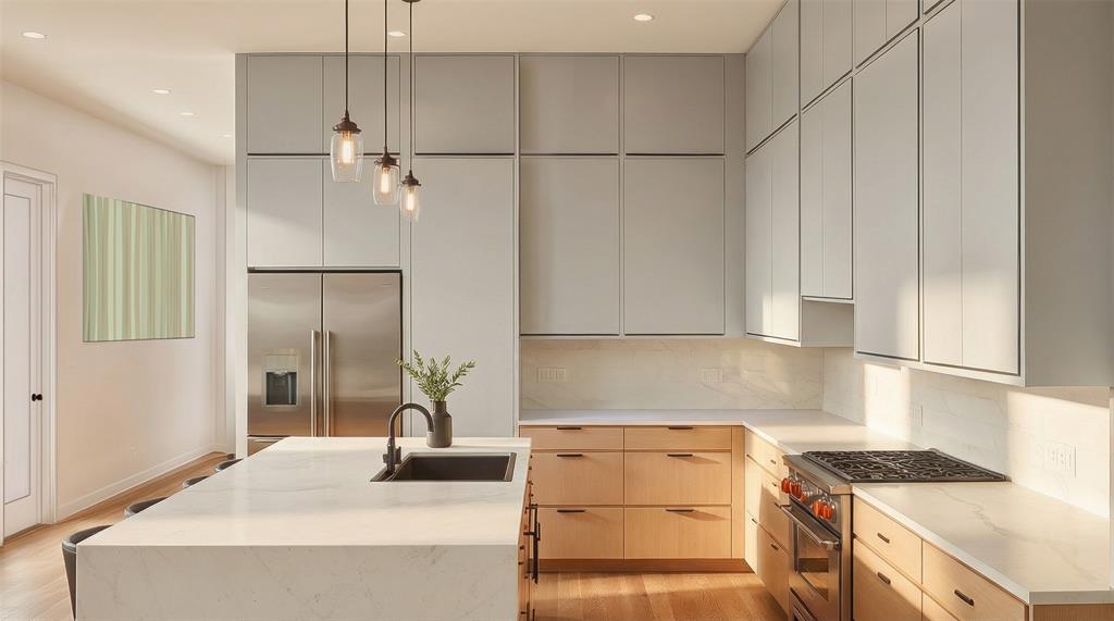 1711 Morris Street Dallas, TX 75212 - Photo 8 of 24 a kitchen with kitchen island a sink stainless steel appliances and cabinets