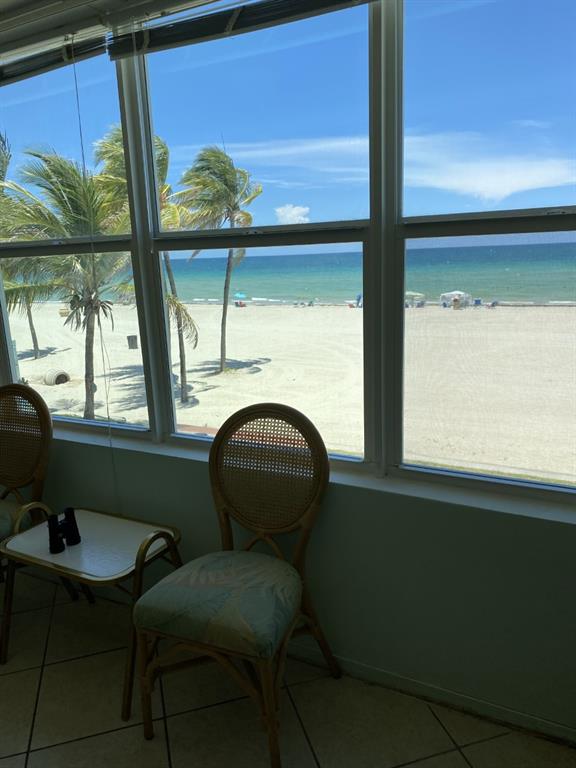 1801 South Surf Road, Unit 2C Hollywood, FL 33019 - Photo 3 of 11 a room with furniture and a window