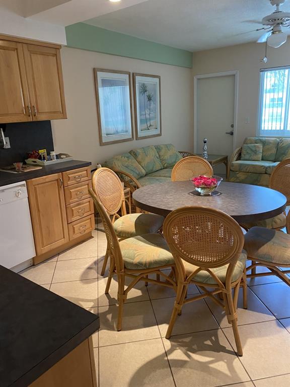1801 South Surf Road, Unit 2C Hollywood, FL 33019 - Photo 7 of 11 a view of a dining room with furniture and a window