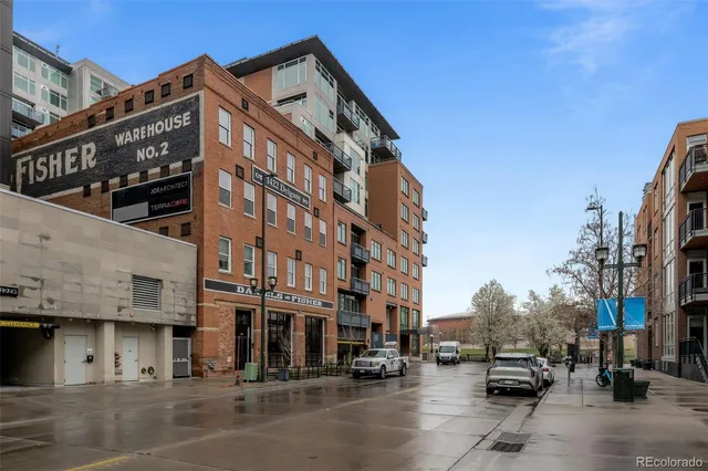 a view of a city with large trees