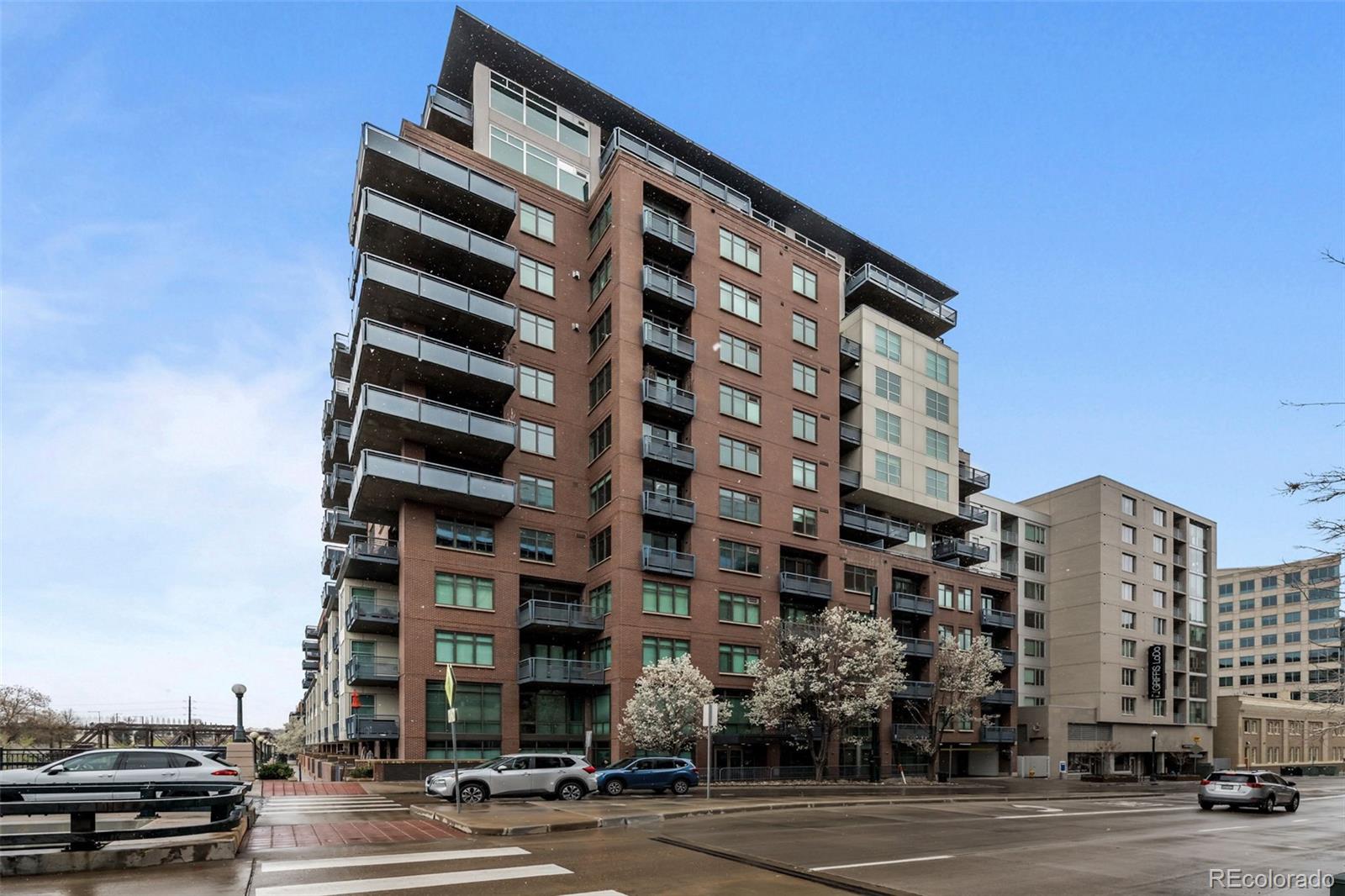 1401 Wewatta Street, Unit 311 Denver, CO 80202 - Photo 5 of 34 front view of a building with a street