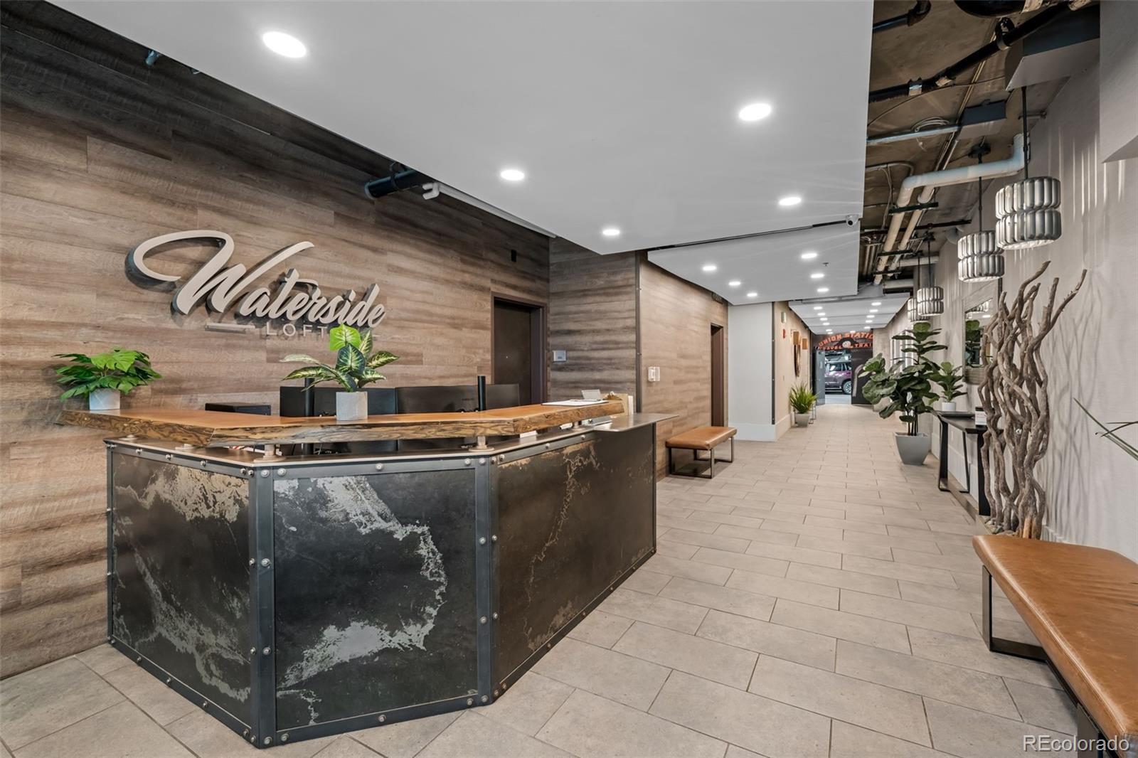 1401 Wewatta Street, Unit 311 Denver, CO 80202 - Photo 8 of 34 a view of a room with gym equipment