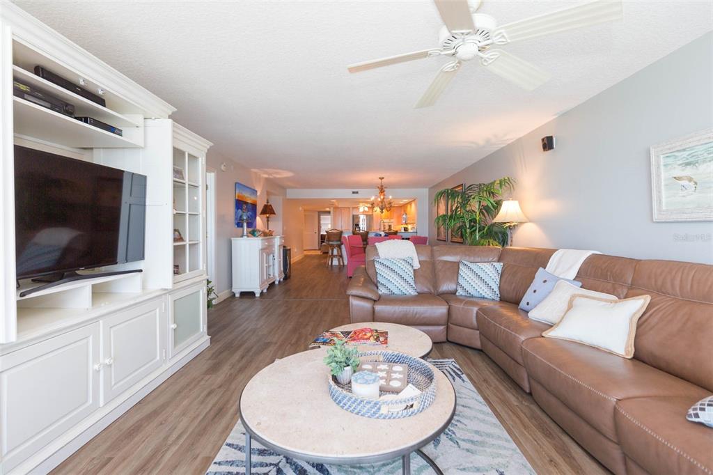 16326 Gulf Boulevard, Unit 109 Redington Beach, FL 33708 - Photo 17 of 63 a living room with furniture and a flat screen tv