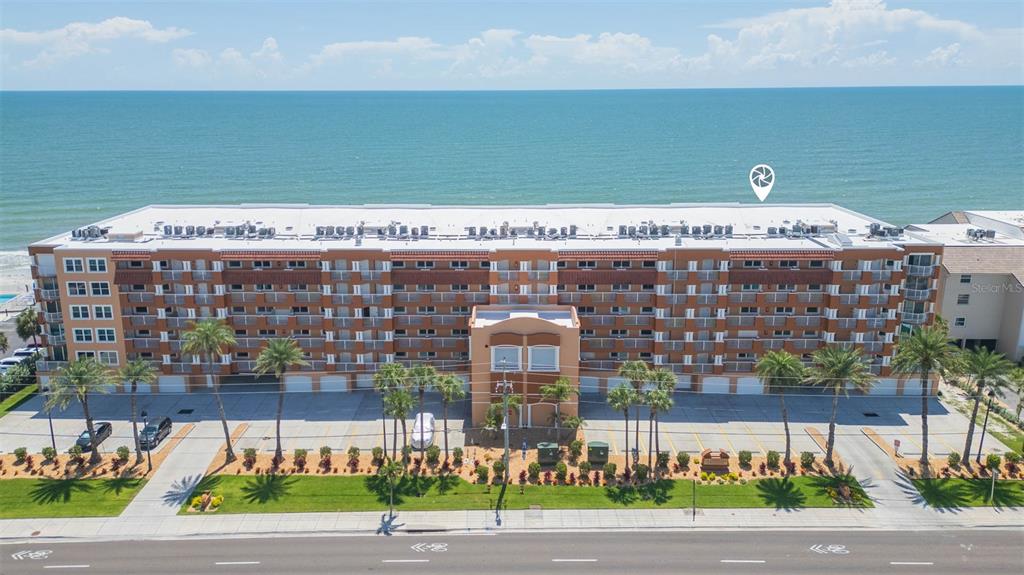 16326 Gulf Boulevard, Unit 109 Redington Beach, FL 33708 - Photo 3 of 63 a view of a building with a street