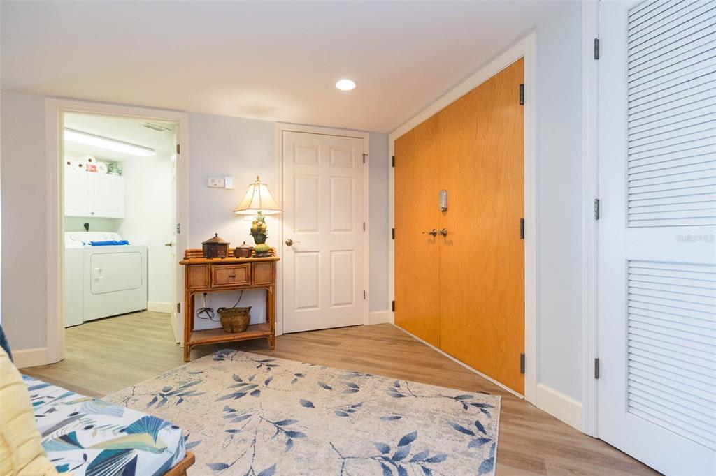 16326 Gulf Boulevard, Unit 109 Redington Beach, FL 33708 - Photo 6 of 63 a bedroom with a bed and a couch in it