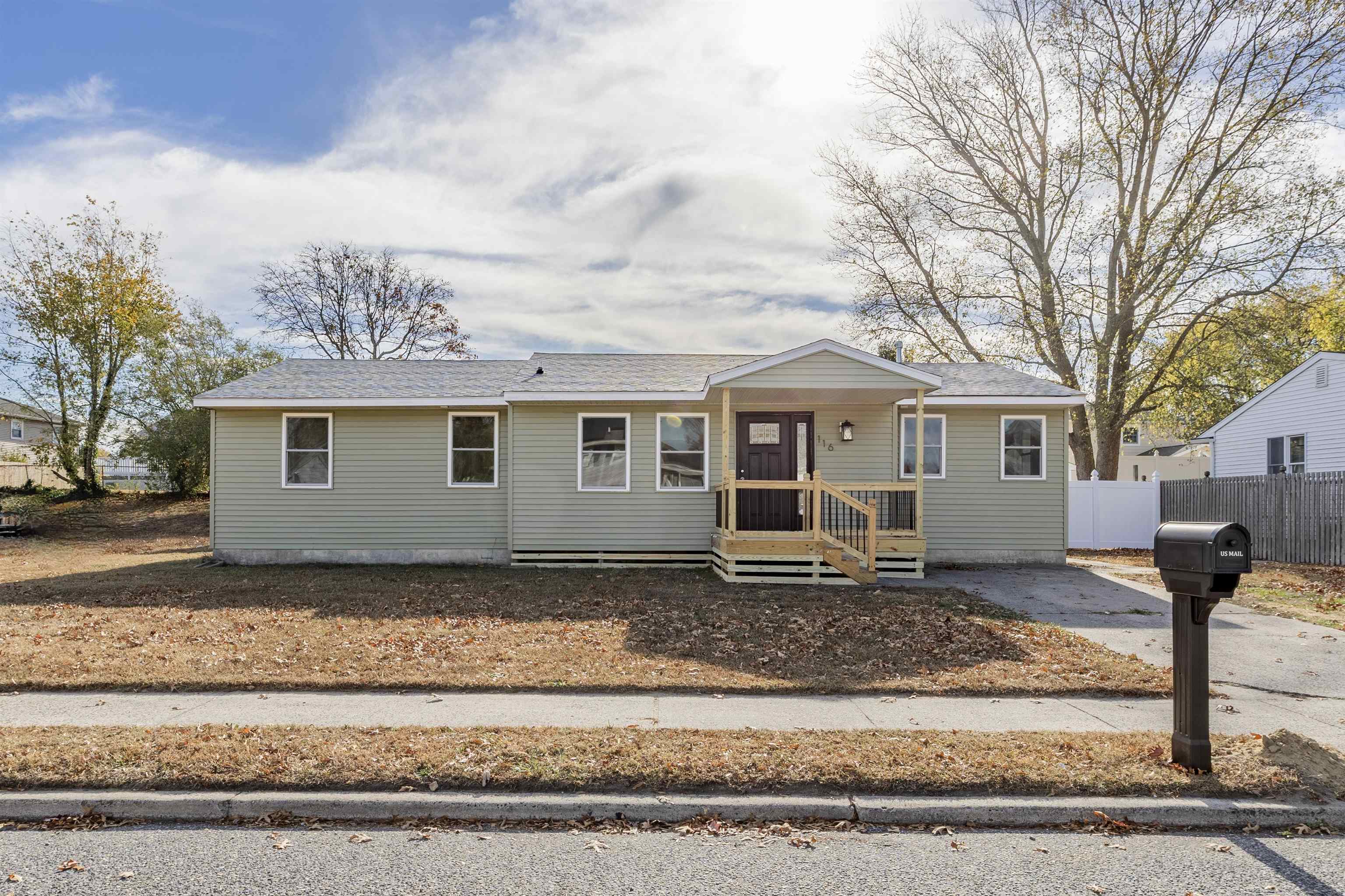116 Orchard Drive North Cape May, NJ 08204 - Photo 1 of 32 a view of a yard in front of a house