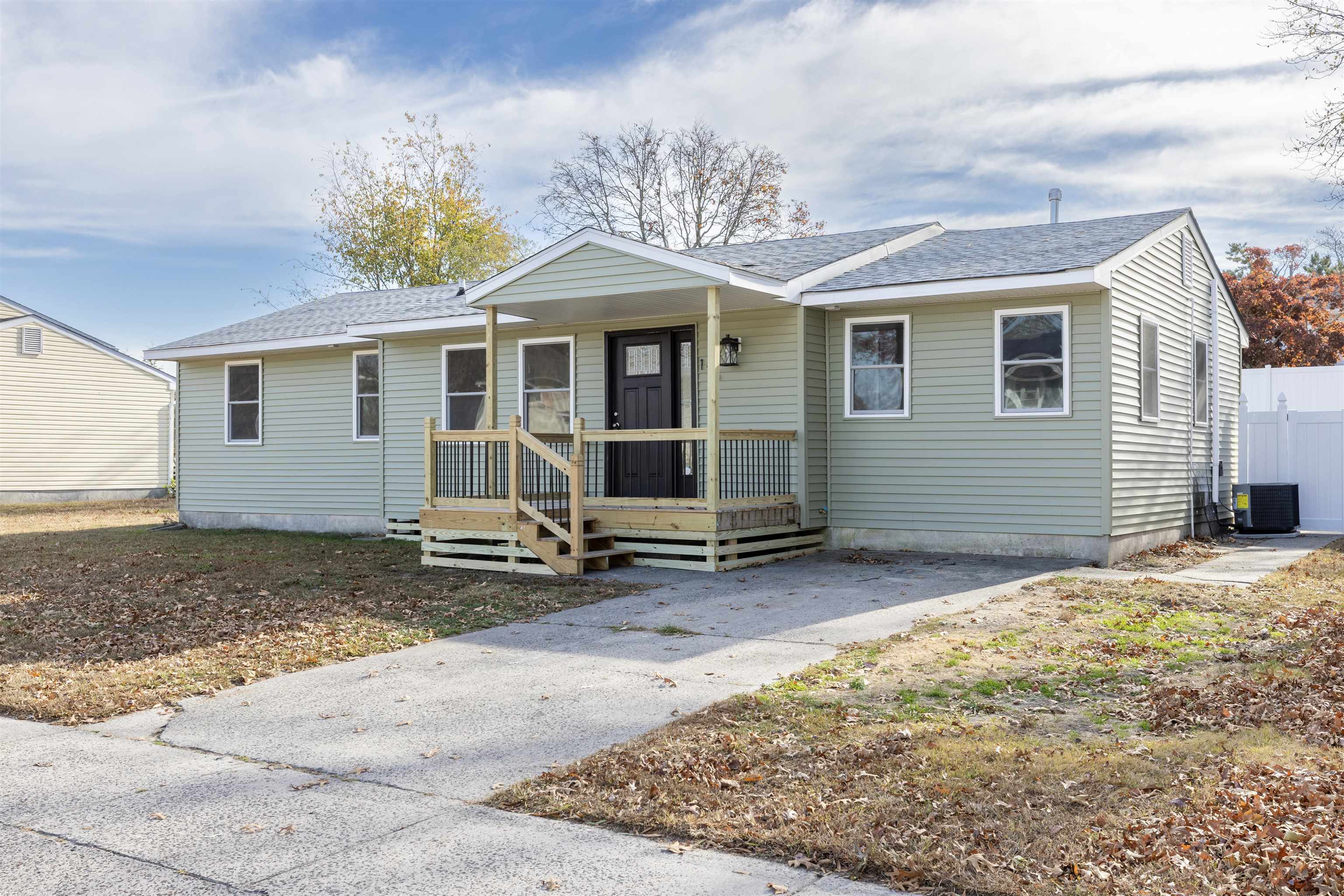 116 Orchard Drive North Cape May, NJ 08204 - Photo 2 of 32 a view of a house with a patio